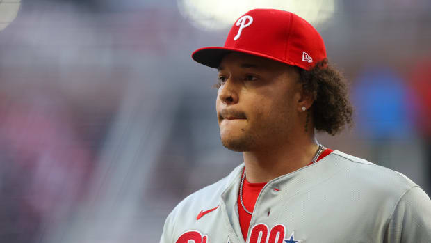 May 26, 2023; Atlanta, Georgia, USA; Philadelphia Phillies starting pitcher Taijuan Walker (99) walks off the field against the Atlanta Braves in the third inning at Truist Park. Mandatory Credit: Brett Davis-USA TODAY Sports