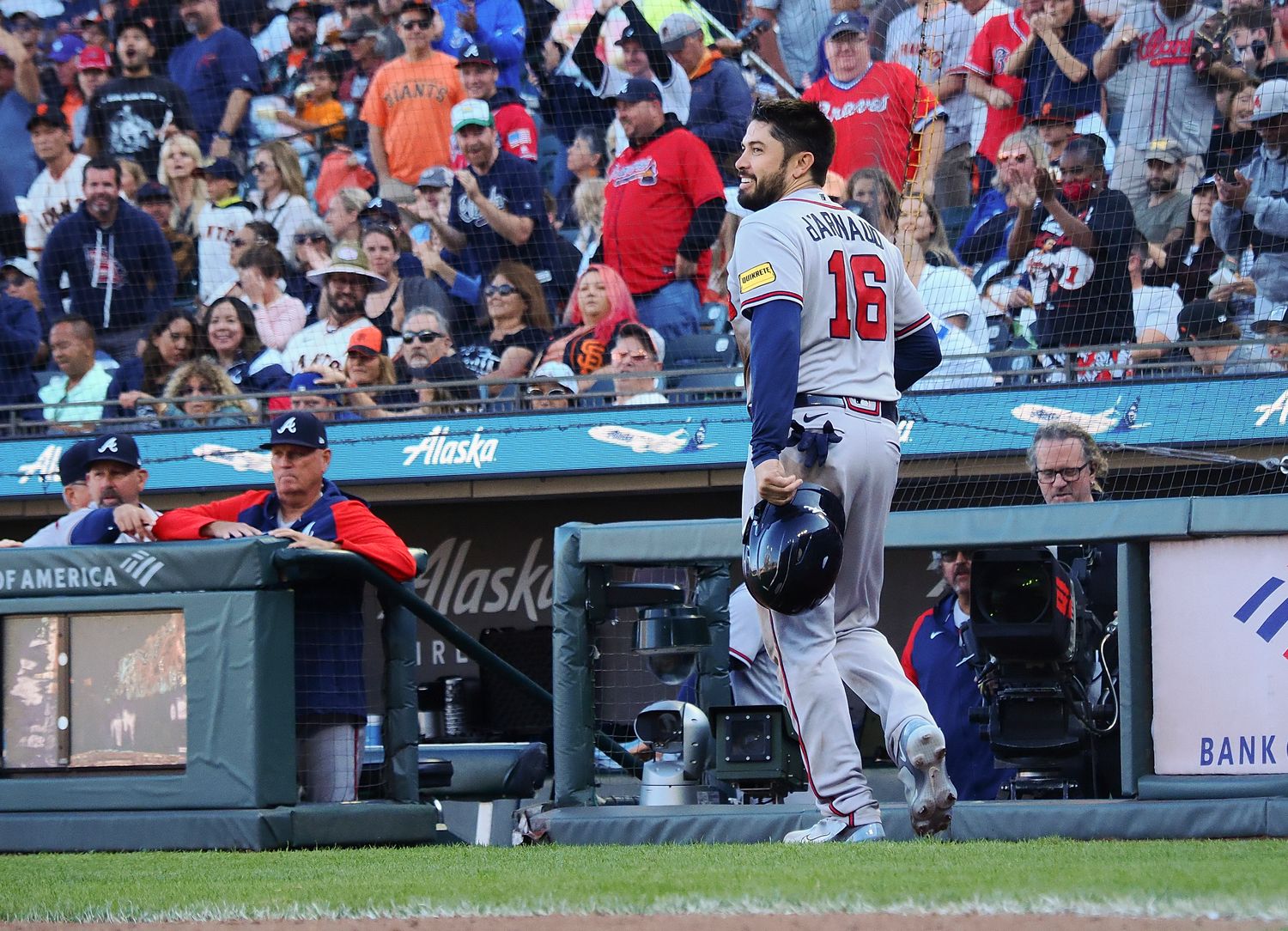 Aug 27, 2023; San Francisco, California, USA; Atlanta Braves catcher Travis d'Arnaud (16) smiles after scoring a run against the San Francisco Giants during the fifth inning at Oracle Park.