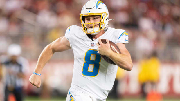 Aug 25, 2023; Santa Clara, California, USA; Los Angeles Chargers quarterback Max Duggan (8) runs with the football during the fourth quarter against the San Francisco 49ers at Levi's Stadium. Mandatory Credit: Stan Szeto-USA TODAY Sports  