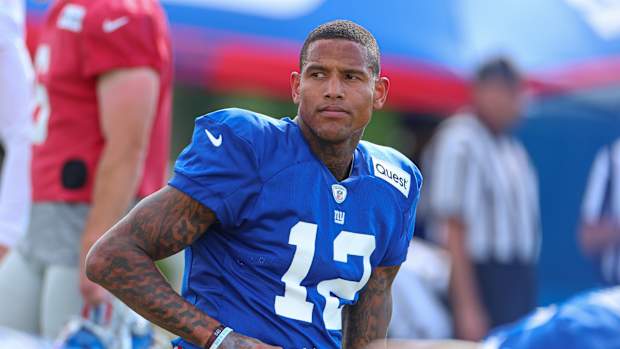 Aug 1, 2023; East Rutherford, NJ, USA; New York Giants tight end Darren Waller (12) stretches during training camp at the Quest Diagnostics Training Facility.
