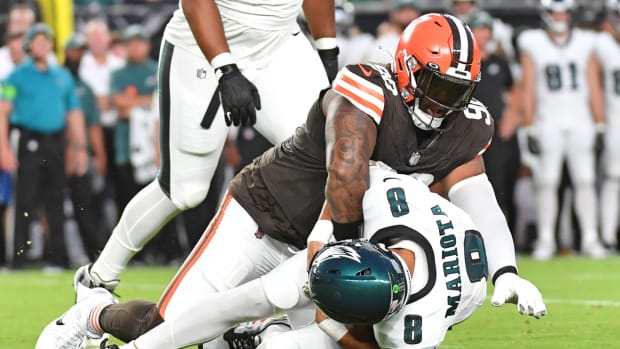 Aug 17, 2023; Philadelphia, Pennsylvania, USA; Cleveland Browns defensive tackle Maurice Hurst (90) sacks Philadelphia Eagles quarterback Marcus Mariota (8) during the first quarter at Lincoln Financial Field. Mandatory Credit: Eric Hartline-USA TODAY Sports