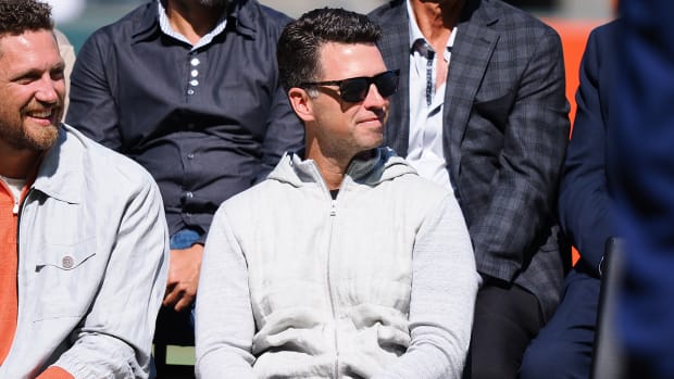 Giants players Hunter Pence (left) and Buster Posey (right) during a Wall of Fame induction ceremony before the game against the Braves at Oracle Park.