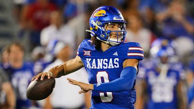 Sep 1, 2023; Lawrence, Kansas, USA; Kansas Jayhawks quarterback Jason Bean (9) throws a pass during the second half against the Missouri State Bears at David Booth Kansas Memorial Stadium. 