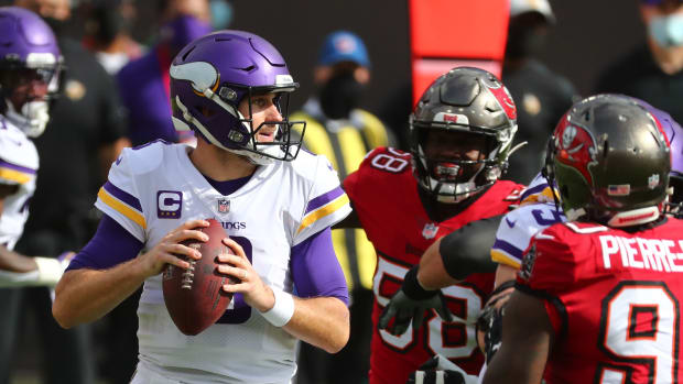 Dec 13, 2020; Tampa, Florida, USA;Minnesota Vikings quarterback Kirk Cousins (8) drops back against the Tampa Bay Buccaneers during the first half at Raymond James Stadium. Mandatory Credit: Kim Klement-USA TODAY Sports