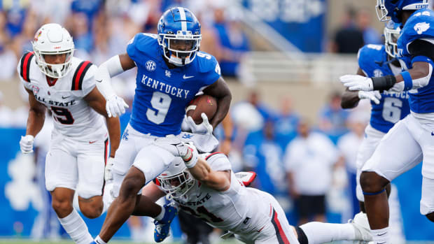 Sep 2, 2023; Lexington, Kentucky, USA; Kentucky Wildcats wide receiver Tayvion Robinson (9) carries the ball during the second quarter against the Ball State Cardinals at Kroger Field. Mandatory Credit: Jordan Prather-USA TODAY Sports