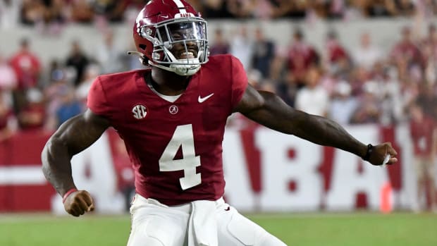 Alabama Crimson Tide quarterback Jalen Milroe (4) celebrates after hitting Alabama Crimson Tide wide receiver Jermaine Burton (3) for a touchdown at Bryant-Denny Stadium. Texas defeated Alabama 34-24.
