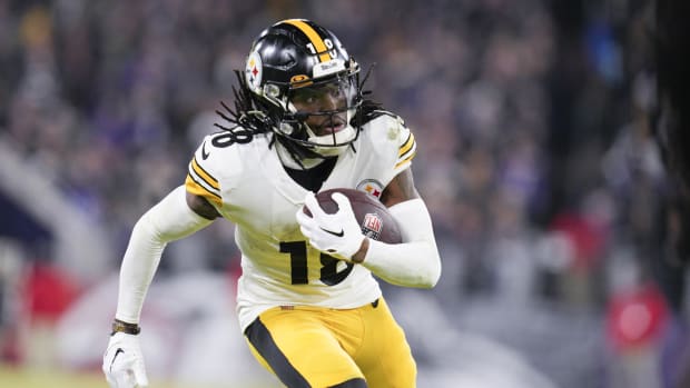 Jan 1, 2023; Baltimore, Maryland, USA; Pittsburgh Steelers wide receiver Diontae Johnson (18) runs with the ball against the Baltimore Ravens during the second half at M&T Bank Stadium. Mandatory Credit: Jessica Rapfogel-USA TODAY Sports