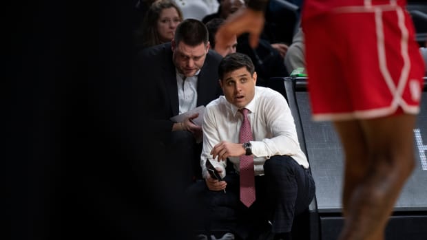 Cincinnati Bearcats head coach Wes Miller looks on in the second half of the NCAA men s basketball game at Fifth Third Arena in Cincinnati on Sunday, Jan 8, 2023. Houston Cougars defeated Cincinnati Bearcats 72-59. Ncaa Basketball Houston Cougars At Cincinnati Bearcats