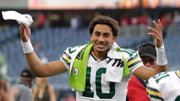 Green Bay Packers quarterback Jordan Love (10) celebrates a victory against the Chicago Bears as he leaves the field during their football game Sunday, September 10, 2023, at Soldier Field in Chicago, Ill. Green Bay won 38-20.