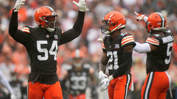 Cleveland Browns defensive end Ogbo Okoronkwo (54) fires up the crowd after the Cincinnati Bengals committed a false start in the second quarter of an NFL football game between the Cincinnati Bengals and Cleveland Browns, Sunday, Sept. 10, 2023, at Cleveland Browns Stadium in Cleveland.