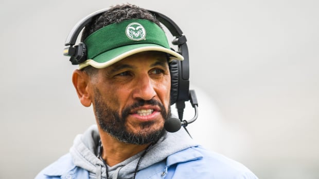 Colorado State football coach Jay Norvell looks on during a practice scrimmage.