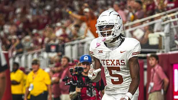 Sep. 9, 2023; Tuscaloosa, Alabama; Texas Longhorns wide receiver Adonai Mitchell (5) celebrates a touchdown against Alabama at Bryant-Denny Stadium on Saturday, Sep. 9, 2023 in Tuscaloosa, Alabama. Mandatory Credit: Aaron E. Martinez-USA TODAY NETWORK  