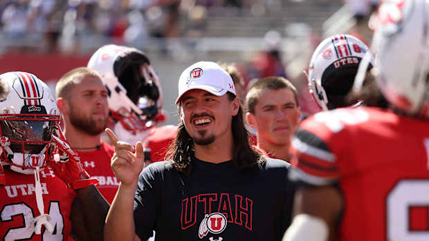 Sep 16, 2023; Salt Lake City, Utah, USA; Utah Utes quarterback Cameron Rising (7) celebrates with teammates after defeating the Weber State Wildcats at Rice-Eccles Stadium. Mandatory Credit: Rob Gray-USA TODAY Sports