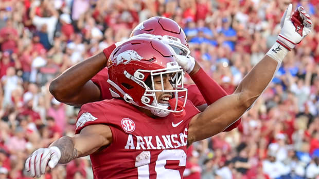 Razorbacks wide receiver Isaiah Sategna after an 88-yard punt return.