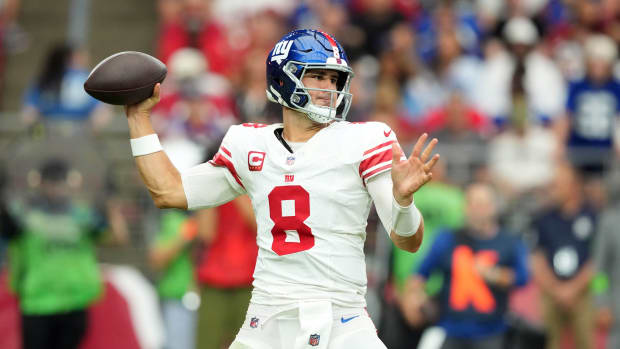 Sep 17, 2023; Glendale, Arizona, USA; New York Giants quarterback Daniel Jones (8) passes against the Arizona Cardinals during the first half at State Farm Stadium.