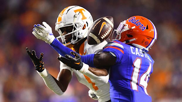Florida safety Jordan Castell (14) breaks up a pass in tended for Tennessee wide receiver Dont'e Thornton Jr. (1) during the NCAA football game between Tennessee and Florida at Ben Hill Griffin Stadium in Gainesville, Fla., on Saturday, Sept. 16, 2023.  
