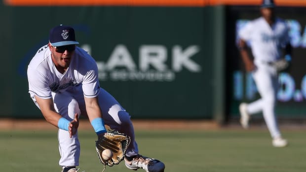 Hooks second baseman Will Wagner fields a ball to first base during the game against the Northwest Arkansas Naturals at Whataburger Field on Thursday, Aug. 17, 2023, in Corpus Christi, Texas.