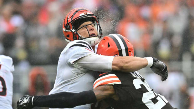 Sep 10, 2023; Cleveland, Ohio, USA; Cleveland Browns safety Grant Delpit (22) hits Cincinnati Bengals quarterback Joe Burrow (9) during the second half at Cleveland Browns Stadium. Mandatory Credit: Ken Blaze-USA TODAY Sports