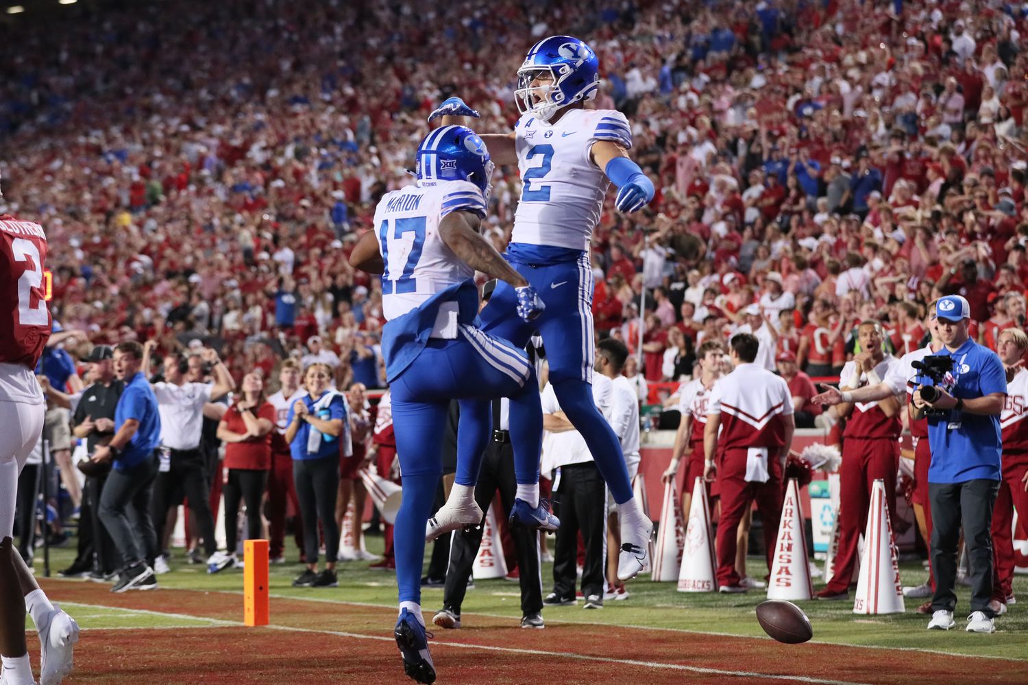 Sep 16, 2023; Fayetteville, Arkansas, USA; BYU Cougars wide receiver Chase Roberts (2) celebrates with wide receiver Keelan Marion (17) after catching a pass for a touchdown in the fourth quarter against the Arkansas Razorbacks at Donald W. Reynolds Razorback Stadium. BYU won 38-31.