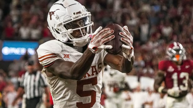 Sep. 9, 2023; Tuscaloosa, Alabama; Texas Longhorns wide receiver Adonai Mitchell (5) catches a ball for a touchdown against Alabama at Bryant-Denny Stadium on Saturday, Sep. 9, 2023 in Tuscaloosa, Alabama. Mandatory Credit: Aaron E. Martinez-USA TODAY NETWORK  