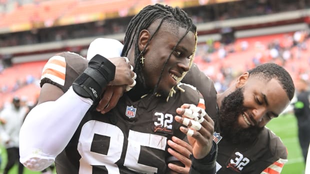Sep 24, 2023; Cleveland, Ohio, USA; Cleveland Browns tight end David Njoku (85) and linebacker Anthony Walker Jr. (5) celebrate after the Browns beat the Tennessee Titans at Cleveland Browns Stadium. Mandatory Credit: Ken Blaze-USA TODAY Sports