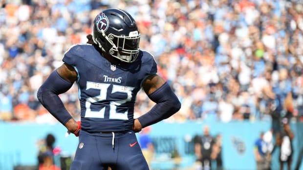 Derrick Henry (22) celebrates after throwing a touchdown pass against the Cincinnati Bengals at Nissan Stadium.  