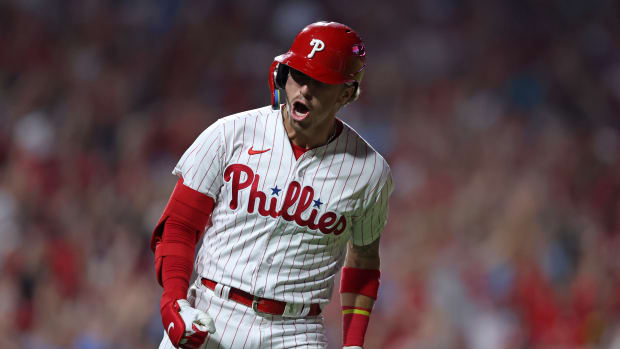 Oct 4, 2023; Philadelphia, Pennsylvania, USA; Philadelphia Phillies second baseman Bryson Stott (5) reacts after hitting a grand slam against the Miami Marlins during the sixth inning for game two of the Wildcard series for the 2023 MLB playoffs at Citizens Bank Park.