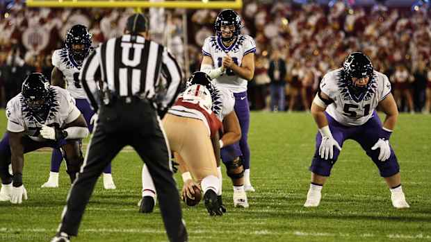 Josh Hoover calls for the snap against Iowa State.