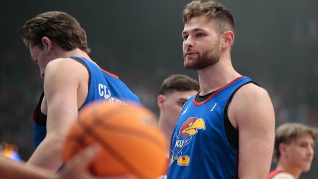 Kansas senior center Hunter Dickinson (1) walks down court during a scrimmage at Friday's Late Night in the Phog inside Allen Fieldhouse.  