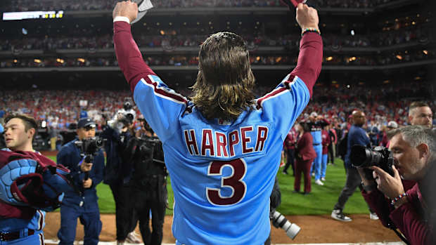 Oct 12, 2023; Philadelphia, Pennsylvania, USA; Philadelphia Phillies first baseman Bryce Harper (3) celebrates the series victory against the Atlanta Braves following game four of the NLDS for the 2023 MLB playoffs at Citizens Bank Park. Mandatory Credit: Eric Hartline-USA TODAY Sports