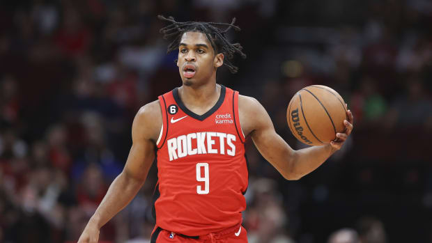 Houston Rockets guard Josh Christopher (9) brings the ball up the court during the second quarter against the Denver Nuggets at Toyota Center.