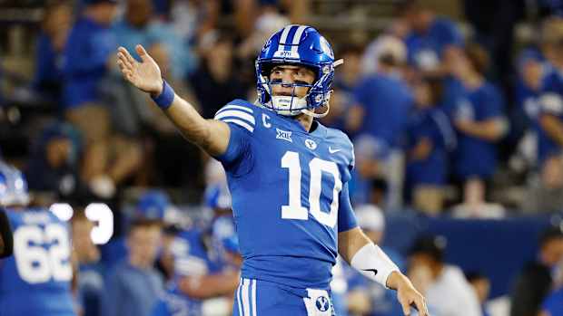 Sep 29, 2023; Provo, Utah, USA; Brigham Young Cougars quarterback Kedon Slovis (10) warms up prior to their game against the Cincinnati Bearcats at LaVell Edwards Stadium.