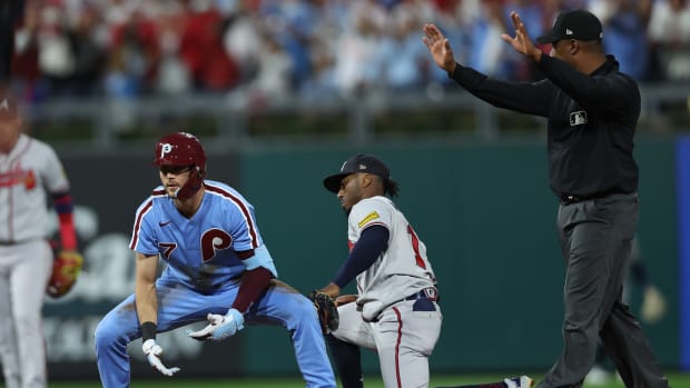 Oct 12, 2023; Philadelphia, Pennsylvania, USA; Philadelphia Phillies shortstop Trea Turner (7) reaches second on a double against the Atlanta Braves during the first inning in game four of the NLDS of the 2023 MLB playoffs at Citizens Bank Park. Mandatory Credit: Bill Streicher-USA TODAY Sports