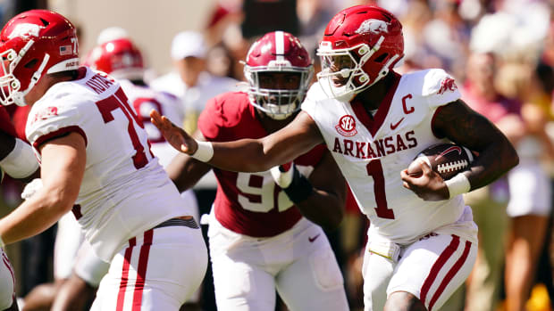 Arkansas Razorbacks quarterback KJ Jefferson (1) scrambles up the field against the Alabama Crimson Tide during the second half at Bryant-Denny Stadium.