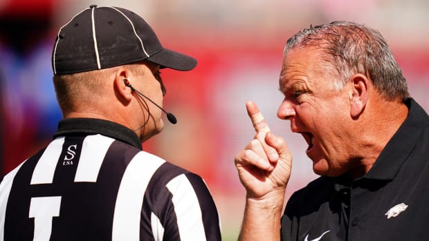Arkansas Razorbacks head coach Sam Pittman dresses down the line judge after failing to make a penalty call during the first quarter against the Alabama Crimson Tide at Bryant-Denny Stadium.