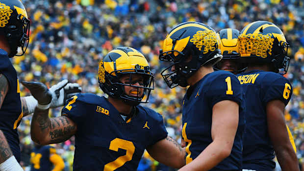 Blake Corum, Roman Wilson