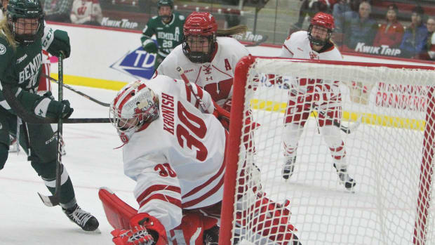 Wisconsin goaltender Cami Kronish makes a save against Bemidji State on Thursday Oct. 20 at LaBahn Arena in Madison, Wis. Uwice Bemidji State 9 Oct 20 2022