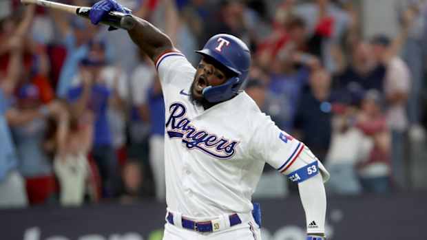 Oct 20, 2023; Arlington, Texas, USA; Texas Rangers right fielder Adolis Garcia (53) celebrates after hitting a three-run home run during the sixth inning of game five in the ALCS against the Houston Astros for the 2023 MLB playoffs at Globe Life Field. Mandatory Credit: Kevin Jairaj-USA TODAY Sports  