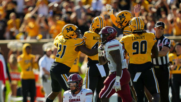 Oct 21, 2023; Columbia, Missouri, USA; South Carolina Gamecocks quarterback Spencer Rattler (7) reacts after being sacked by the Missouri Tigers during the first half at Faurot Field at Memorial Stadium. Mandatory Credit: Jay Biggerstaff-USA TODAY Sports