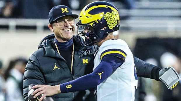 Jim Harbaugh and JJ McCarthy