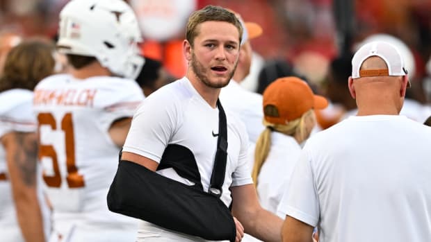 Oct 21, 2023; Houston, Texas, USA; Texas Longhorns quarterback Quinn Ewers (3) stands on the sideline in a sling after coming out of the game during the third quarter against the Houston Cougars at TDECU Stadium. Mandatory Credit: Maria Lysaker-USA TODAY Sports