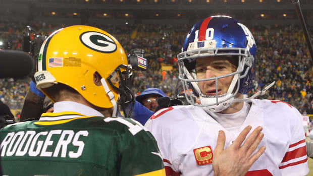 Aaron Rodgers and Eli Manning following an NFC Wildcard game