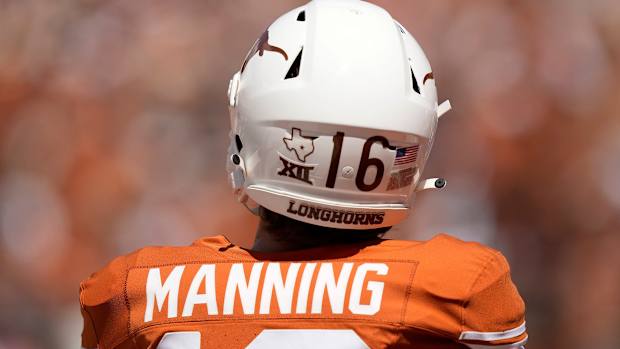 Texas Longhorns quarterback Arch Manning warms up before the game against the Kansas Jayhawks at Royal-Memorial Stadium on Saturday, September 30, 2023