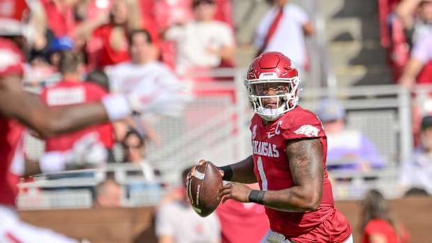 Razorbacks quarterback KJ Jefferson rolls out against Mississippi State on Saturday