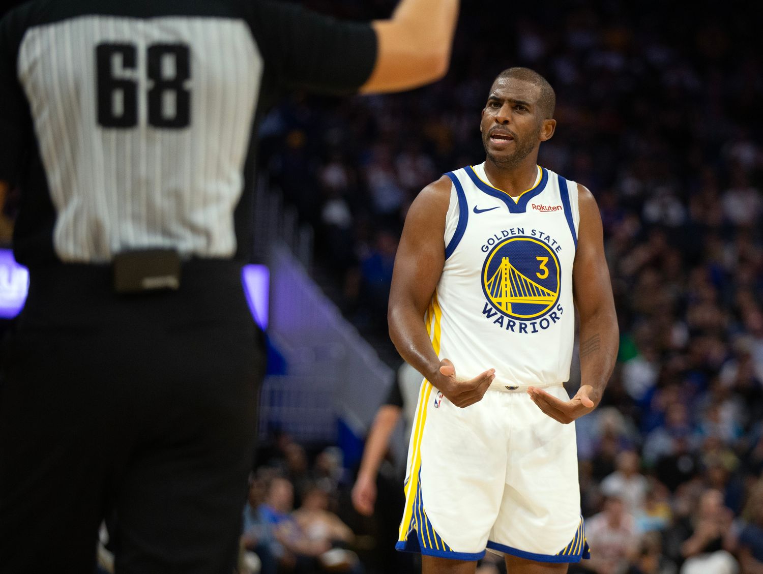 Warriors guard Chris Paul reacts during Golden State's 116-115 exhibition win over the Kings on Oct. 18, 2023.