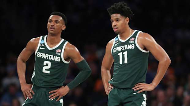 Michigan State guards Tyson Walker and A.J. Hoggard.