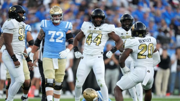 Colorado Buffaloes linebacker Jordan Domineck (44) celebrates after sacking UCLA Bruins quarterback Ethan Garbers (4) in the first half at Rose Bowl
