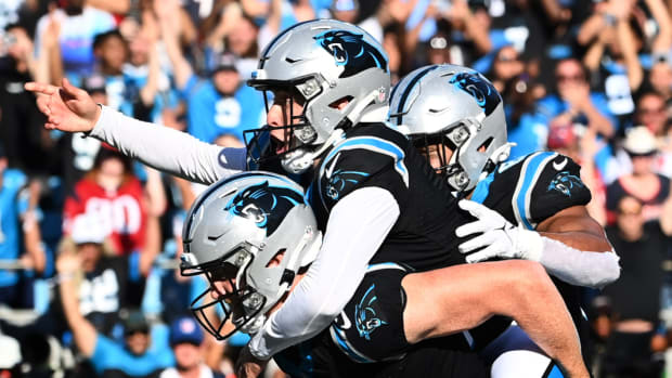 Panthers kicker Eddy Pineiro celebrates making a game-winning field goal.
