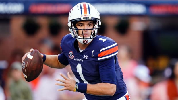 Oct 28, 2023; Auburn, Alabama, USA; Auburn Tigers quarterback Payton Thorne (1) rolls out to pass against the Mississippi State Bulldogs during the fourth quarter at Jordan-Hare Stadium. Mandatory Credit: John David Mercer-USA TODAY Sports  
