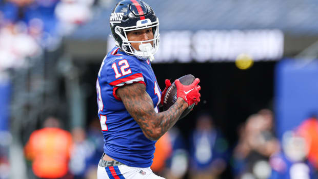 Oct 22, 2023; East Rutherford, New Jersey, USA; New York Giants tight end Darren Waller (12) catches the ball during the first half Washington Commanders at MetLife Stadium. Mandatory Credit: Vincent Carchietta-USA TODAY Sports  
